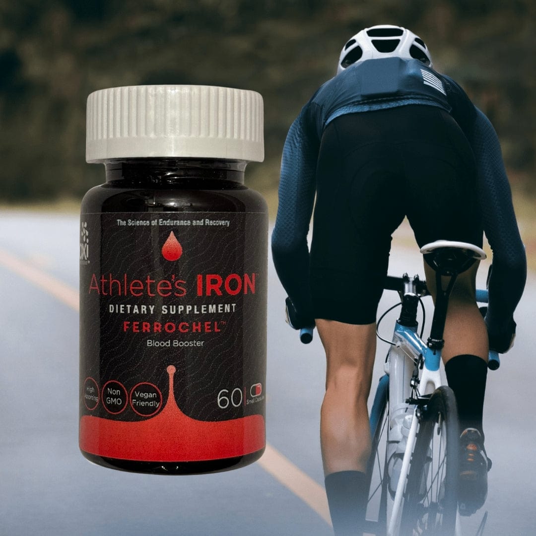 Athlete's Iron bottle next to a road cyclist